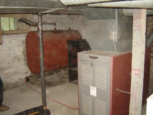 The existing heating system included an inefficient oil-fired furnace.