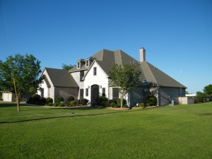 Home with large lawn area